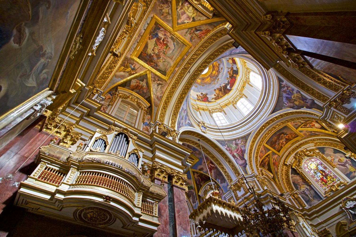 The richly ornate interior of the Mdina Cathedral