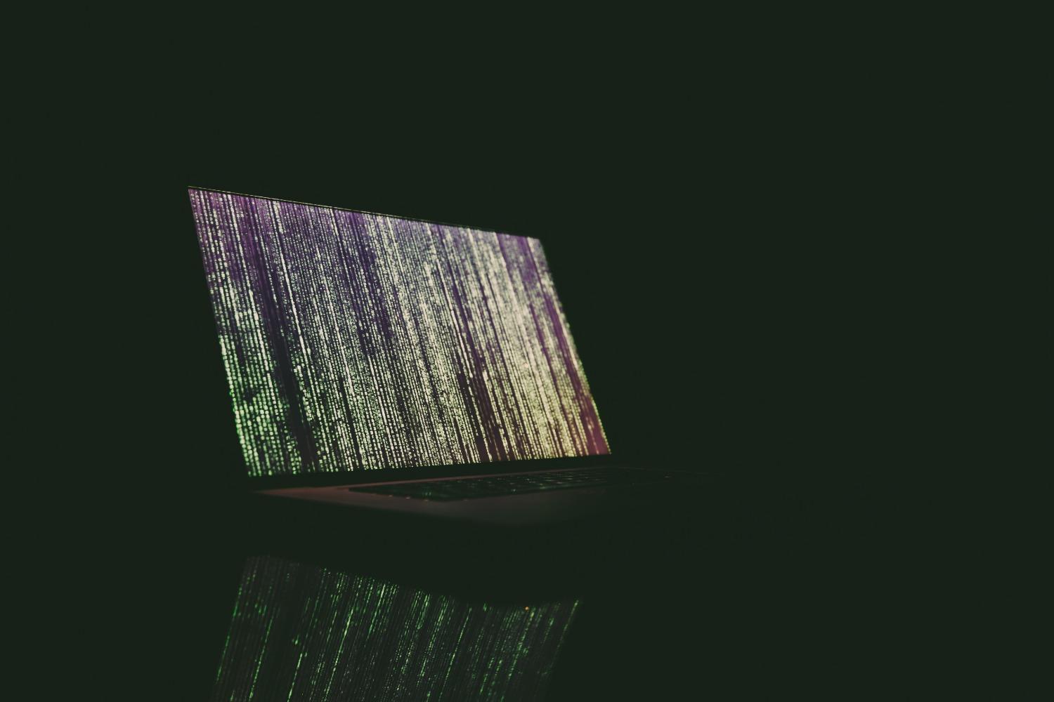 Code runs across a laptop