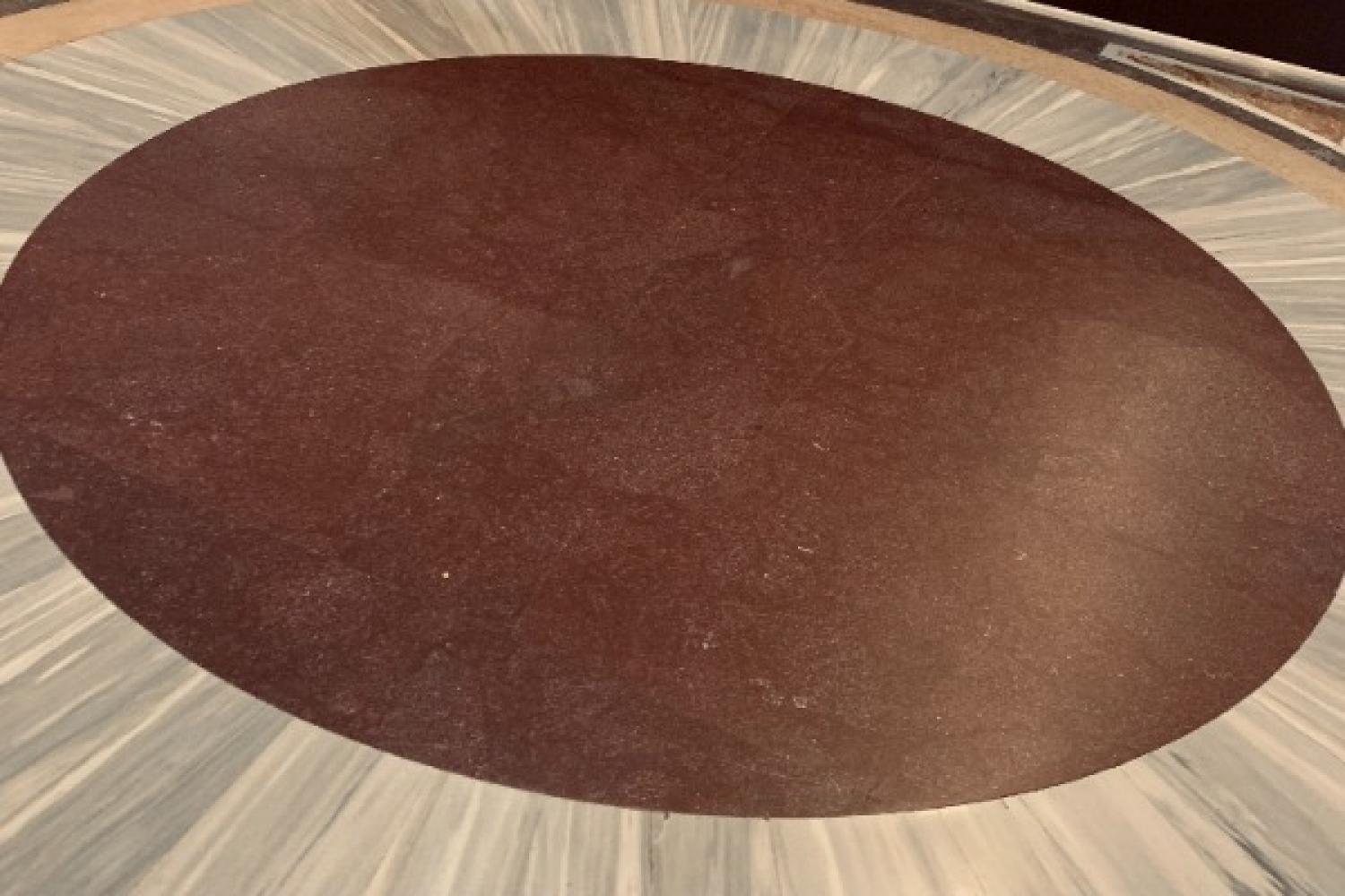The porphyry disk in St. Peter's Basilica, on which Charlemagne was crowned Holy Roman Emperor and countless Christian pilgrims have walked.