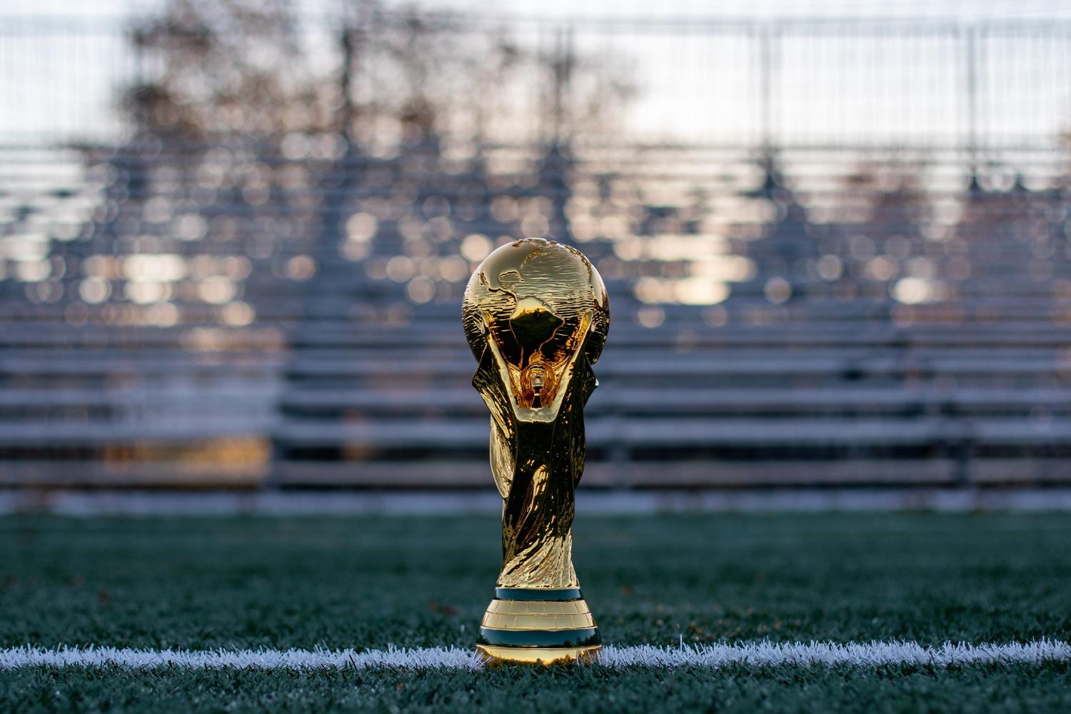 World Cup trophy on a field