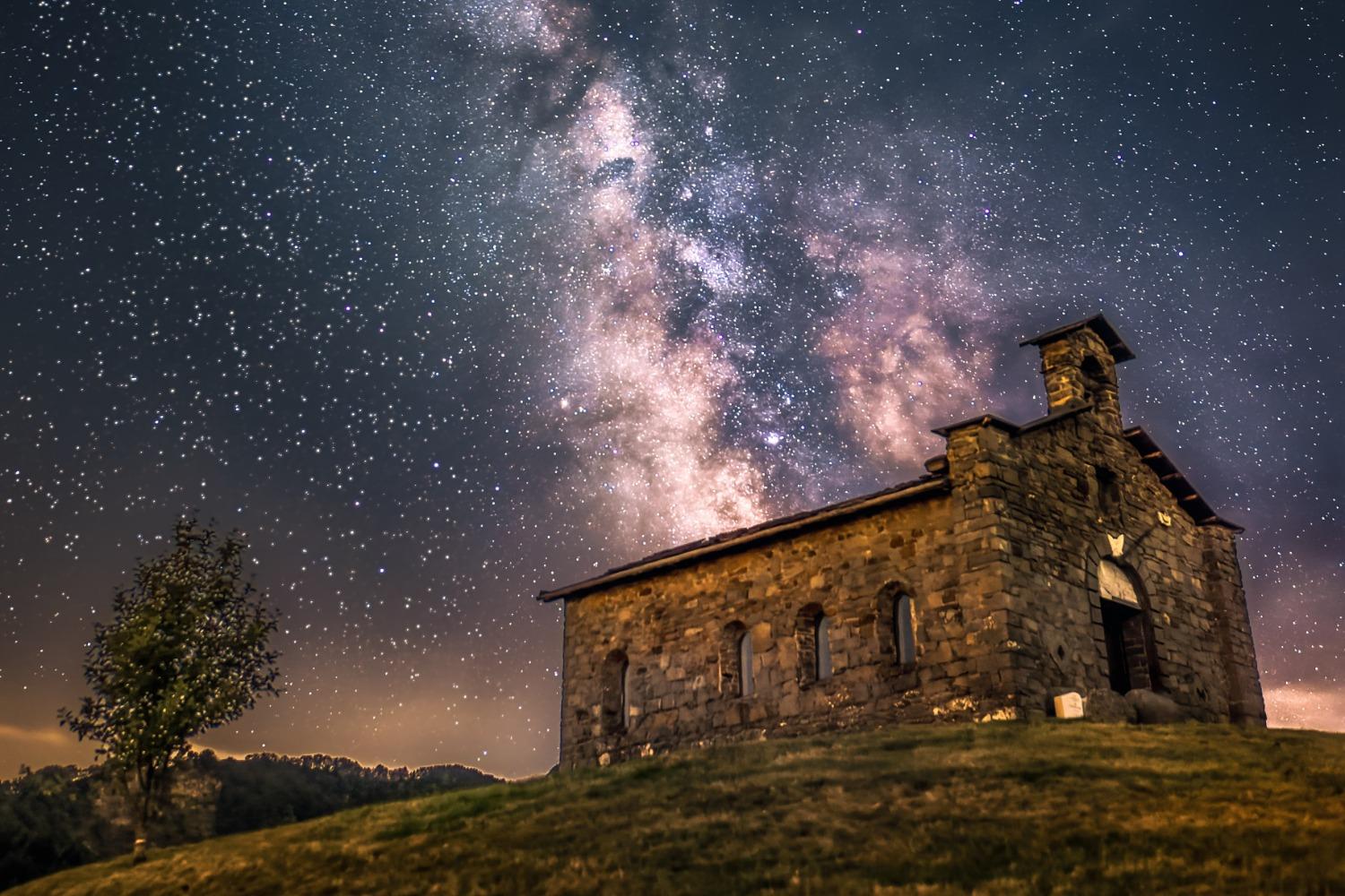 A chapel under a starry sky