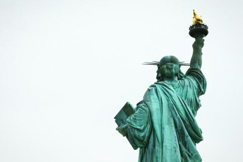 The Statue of Liberty looks ahead