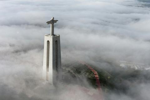 Christ over the fog