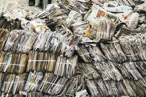 newspapers in garbage