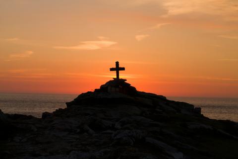 sunset on cross